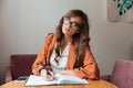 portrait-pretty-woman-taking-notes