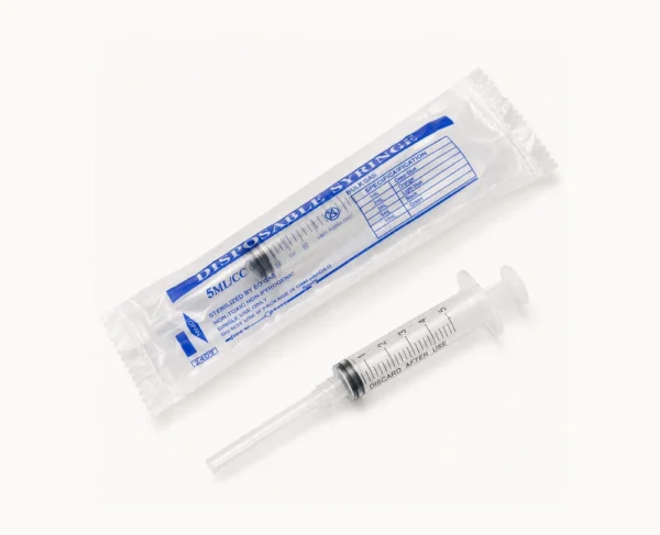 syringeA - LUX PEPTIDES Sterile disposable syringe with clear graduated barrel, placed beside its sealed packaging labeled 5 mL.