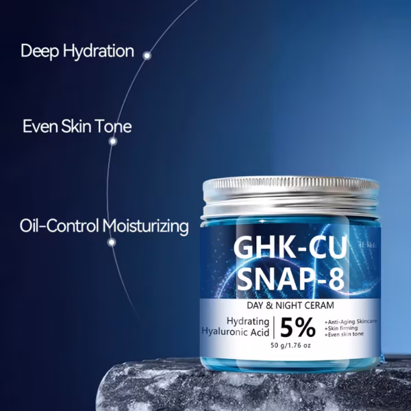 Blue jar of GHK-CU SNAP-8 Day & Night Cream on a rocky surface, with labels noting Deep Hydration, Even Skin Tone, and Oil-Control Moisturizing.