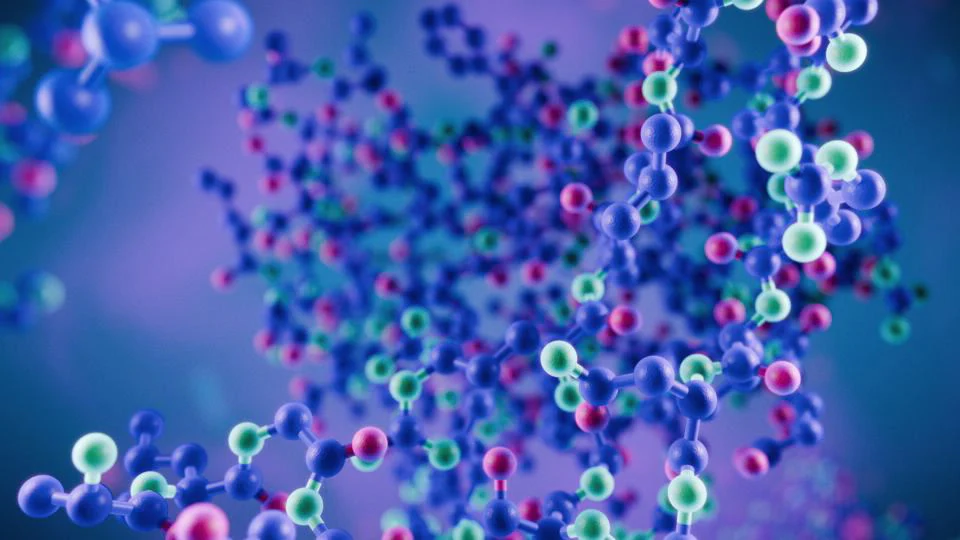 Modèle moléculaire 3D coloré montrant des atomes connectés en bleu, vert et rose avec des liaisons formant des structures de type chaîne pour un contexte de chimie/biologie (informatif)
