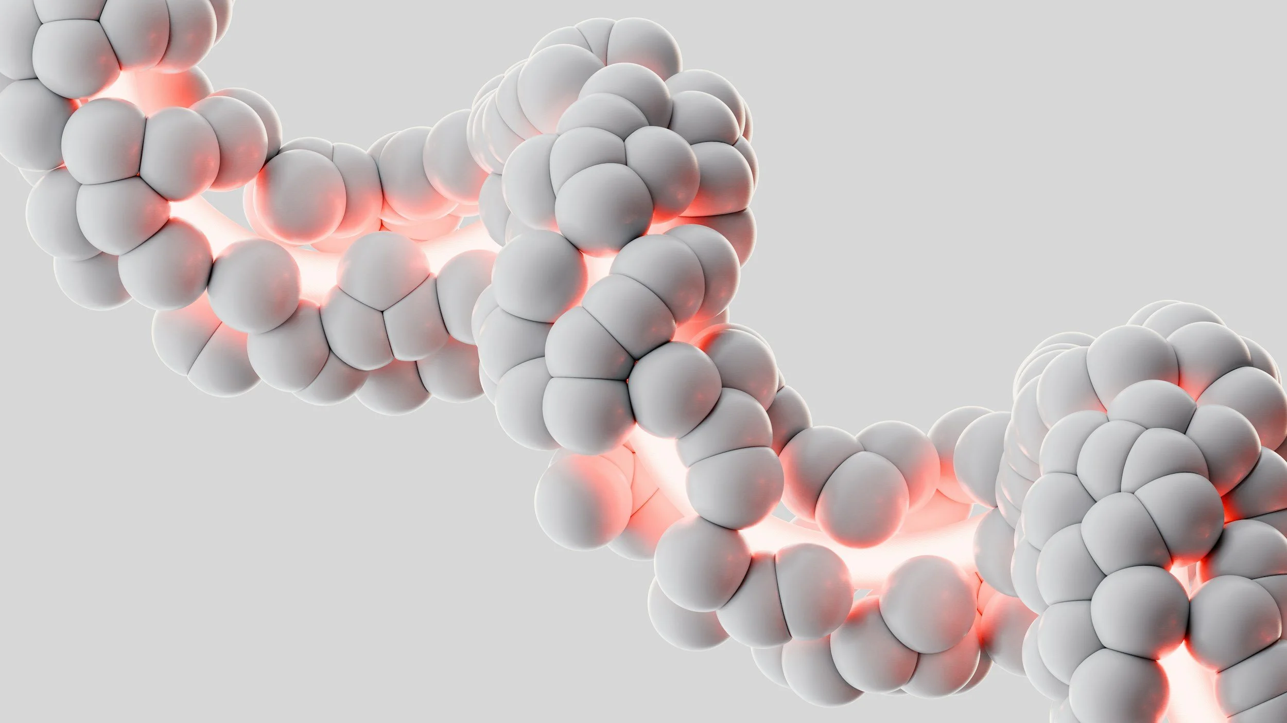 IMG_3349 - LUX PEPTIDES Abstract 3D spheres forming a twisting molecular-like chain with red glow, suggesting molecular structure or cellular connection.